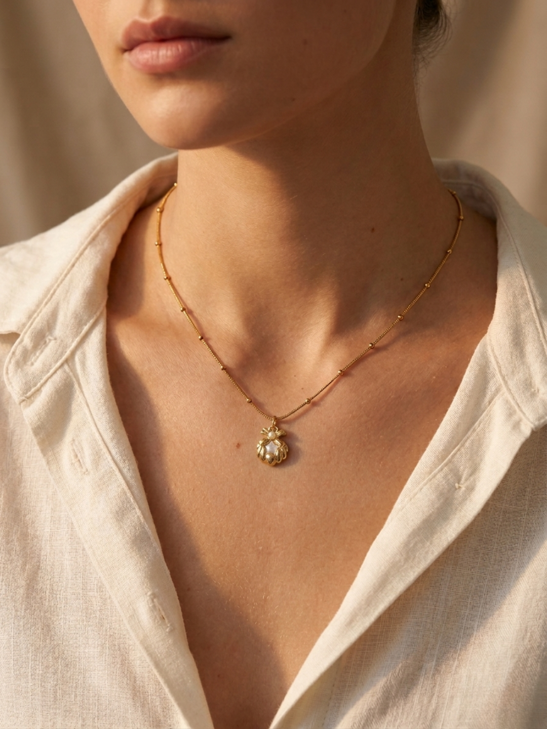 Gold plated halo shell pendant