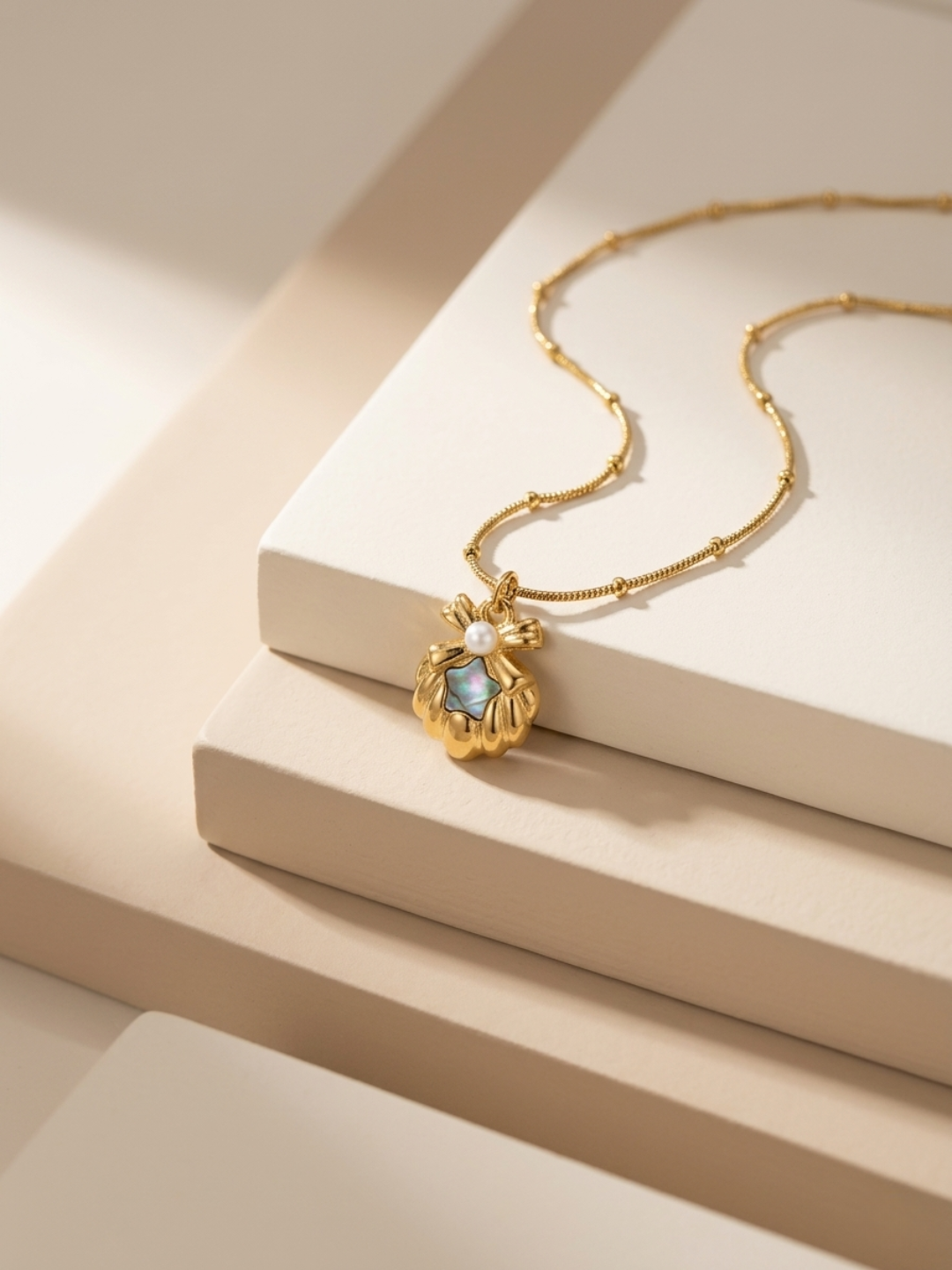 Gold plated halo shell pendant