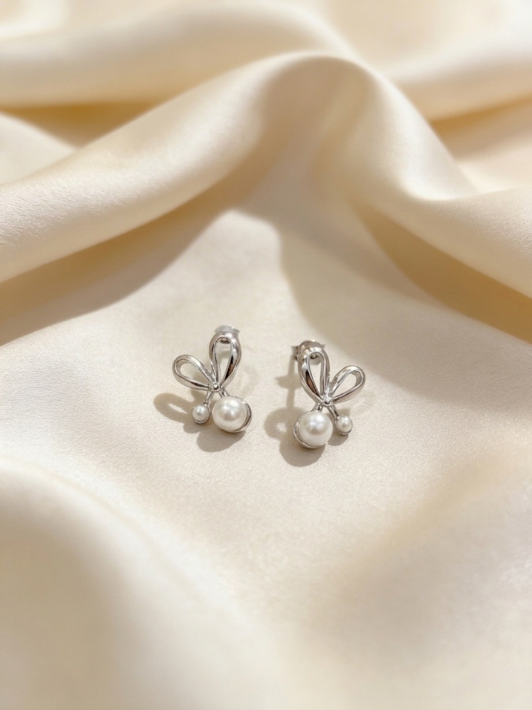 Butterfly pearl studs