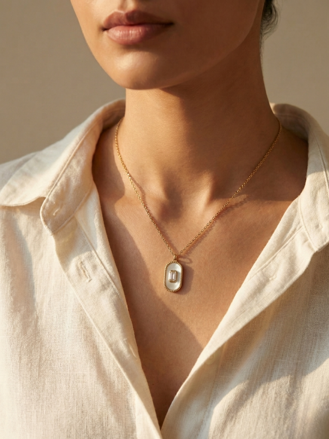 Gold plated crystal frame pendant